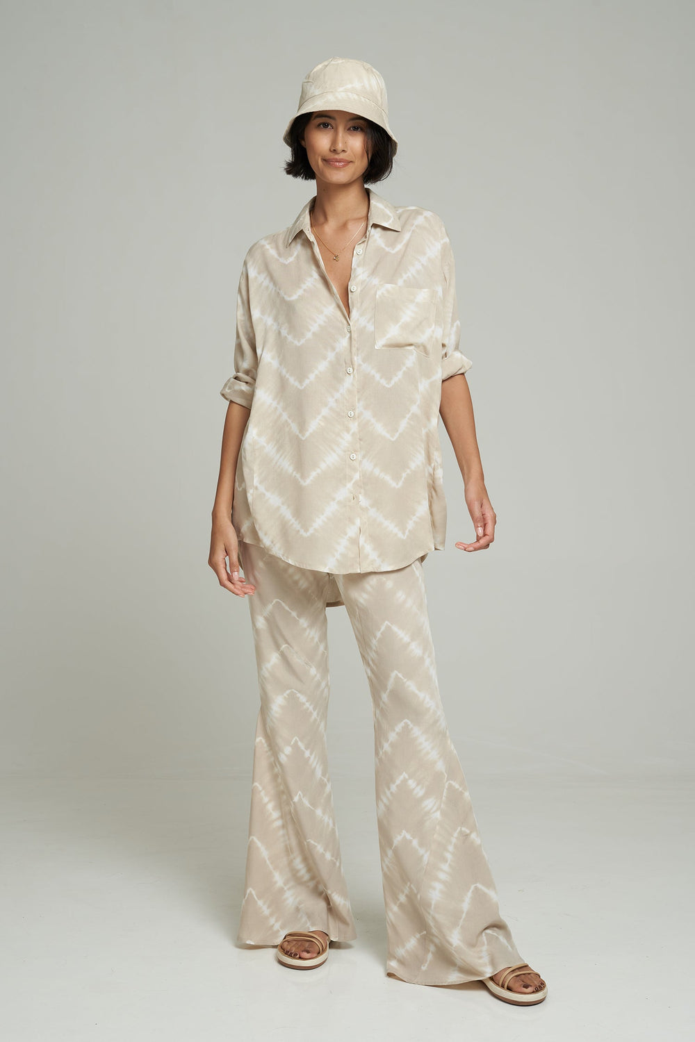 MARINA TIE DYE FLARE PANTS | SAND/VANILLA